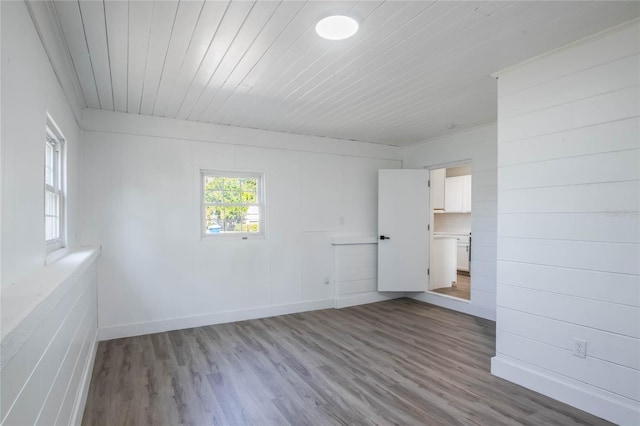 spare room with hardwood / wood-style flooring