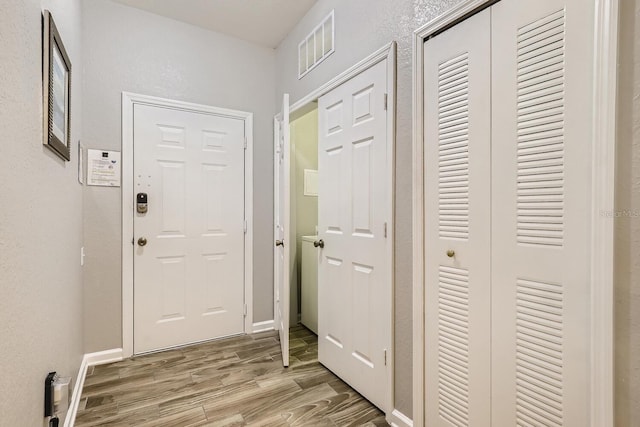 entryway featuring hardwood / wood-style floors