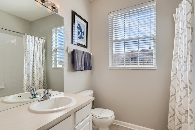 bathroom featuring toilet, a shower with curtain, and vanity