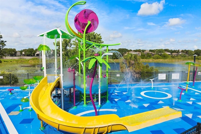 view of home's community with a water view