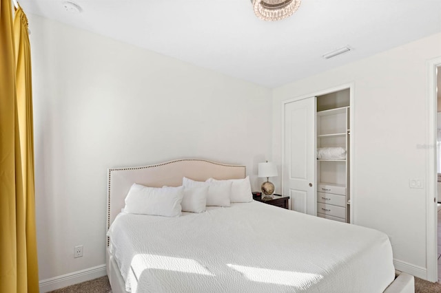 bedroom featuring carpet floors and a closet