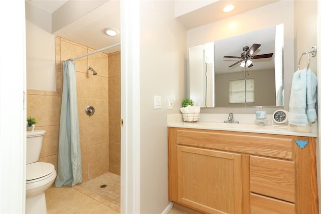 bathroom featuring toilet, a shower with shower curtain, vanity, ceiling fan, and tile walls