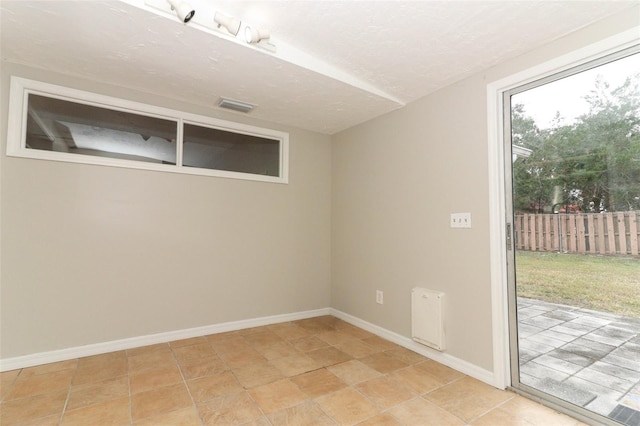 view of tiled empty room