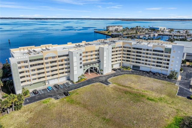 birds eye view of property featuring a water view