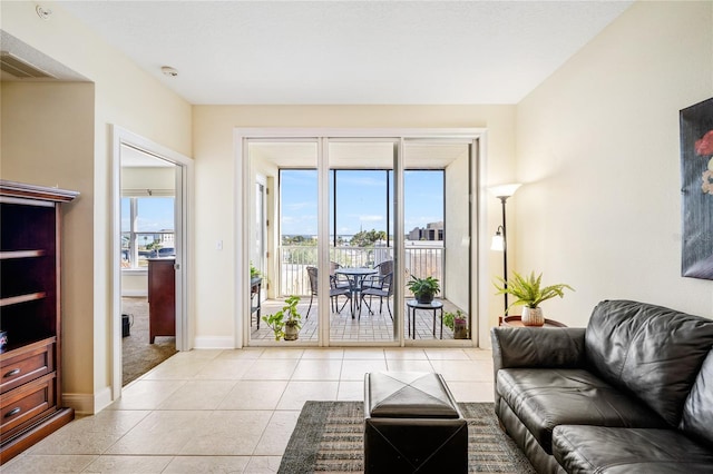 living room with light tile patterned flooring