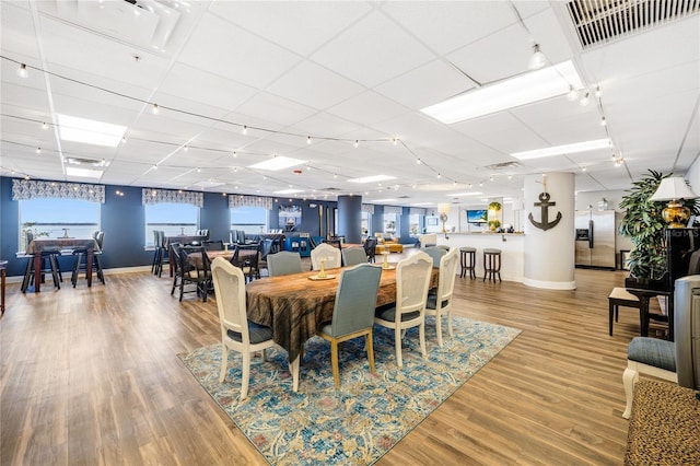 dining space featuring hardwood / wood-style floors