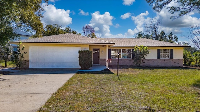 ranch-style home with a front yard and a garage