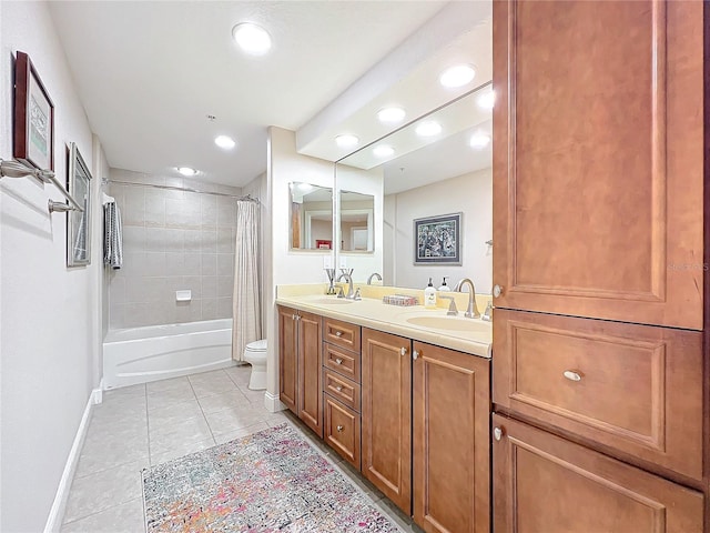 full bathroom featuring tile patterned floors, toilet, vanity, and shower / bath combo