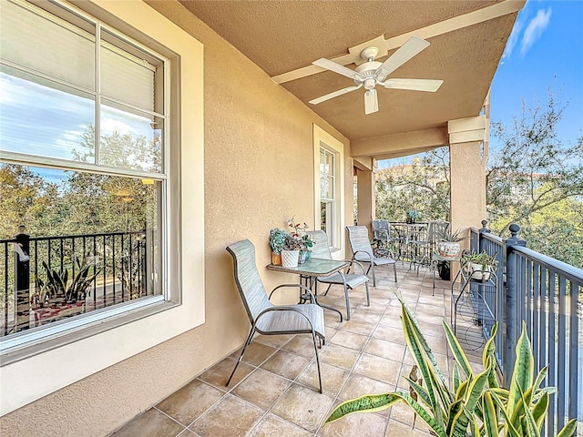 balcony featuring ceiling fan