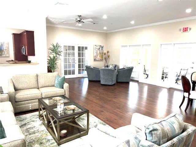 living room featuring crown molding, dark wood-type flooring, ceiling fan, and french doors