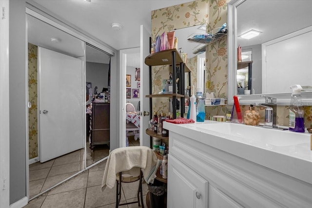 bathroom with vanity and tile patterned floors