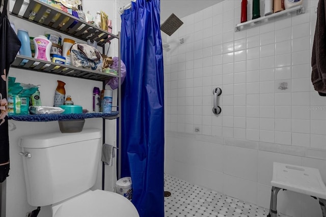 bathroom with toilet and walk in shower