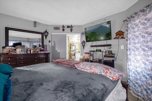 bedroom with a textured ceiling