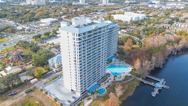 birds eye view of property with a water view