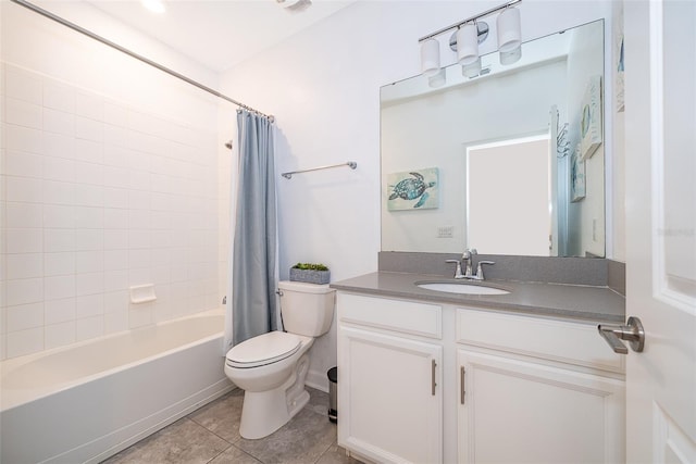 full bathroom featuring shower / bath combo, vanity, tile patterned floors, and toilet