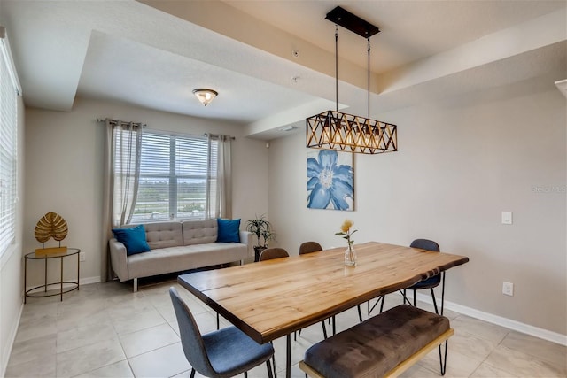 dining room featuring light tile patterned floors