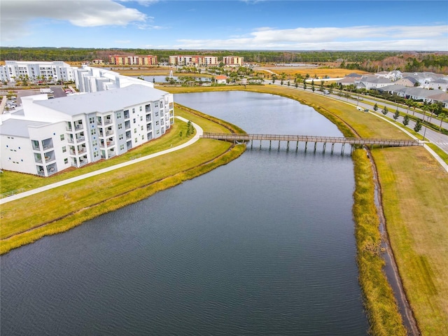 drone / aerial view with a water view