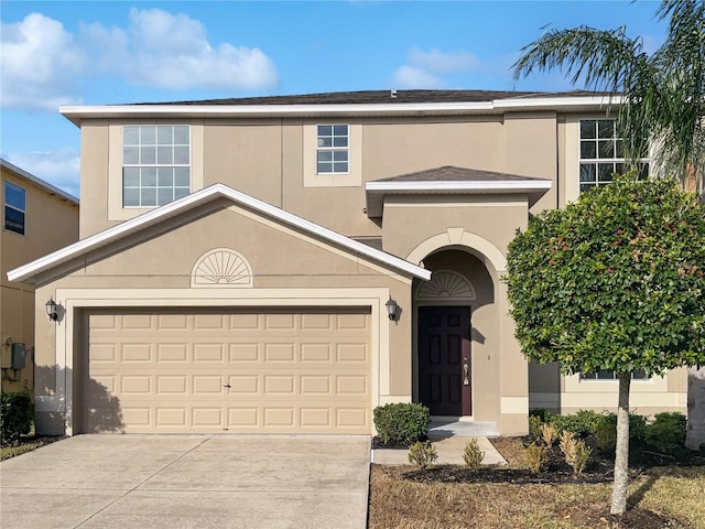 view of front of home with a garage