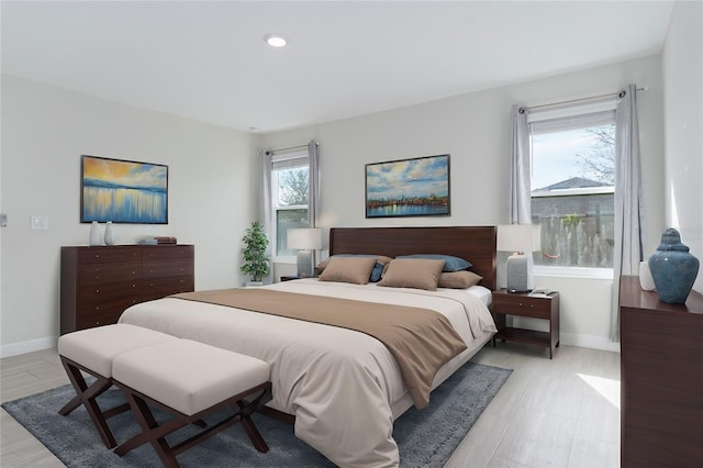 bedroom with light hardwood / wood-style floors