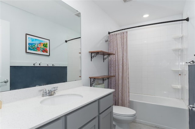 full bathroom featuring vanity, shower / bathtub combination with curtain, and toilet