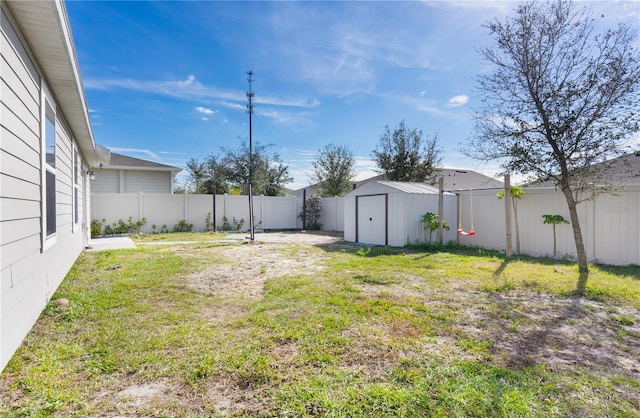 view of yard featuring a storage unit