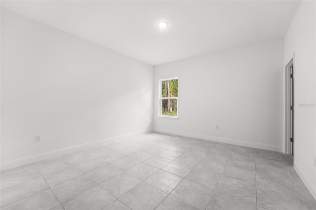 3179 W Barberton Pl, Citrus Springs, FL 34433 - empty room with recessed lighting and light tile patterned floors