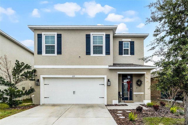 view of front of property featuring a garage