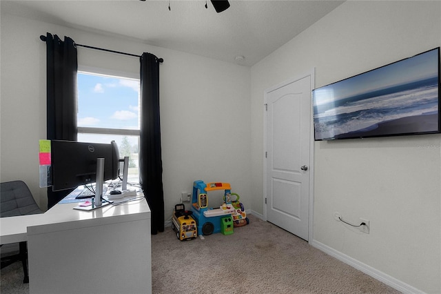 office featuring light carpet and ceiling fan