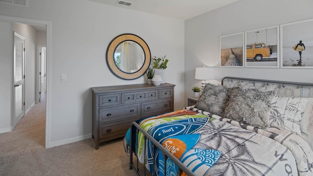 bedroom with light carpet