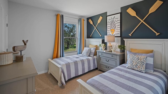 bedroom featuring light colored carpet