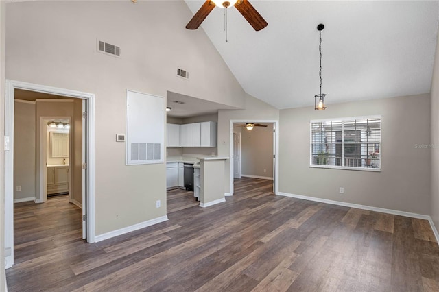 unfurnished living room featuring high vaulted ceiling, dark hardwood / wood-style flooring, and ceiling fan