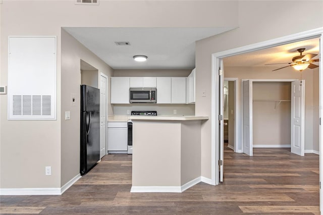 kitchen with black fridge, white cabinetry, electric range, and dark hardwood / wood-style floors