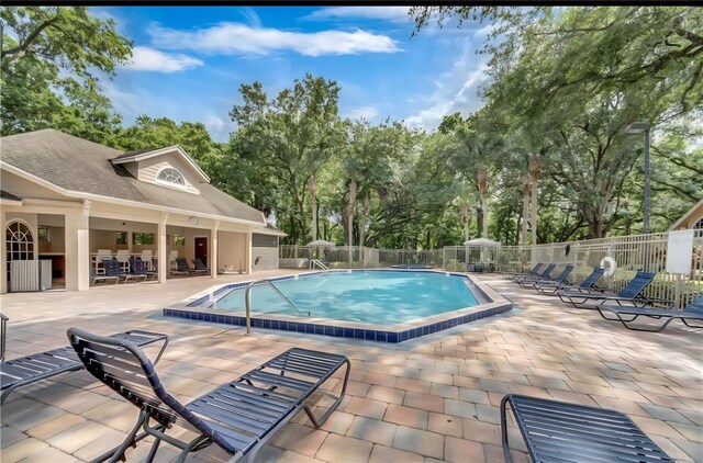 605 Youngstown Pkwy Unit 32, Altamonte Springs, FL 32714 - community pool featuring fence and a patio