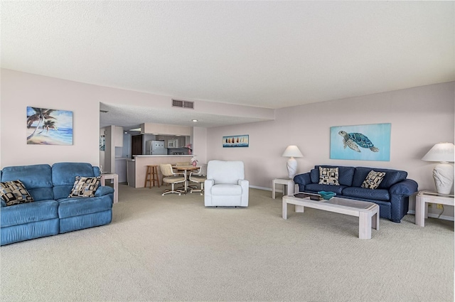 living room featuring carpet floors