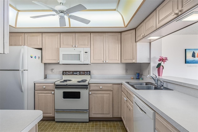 kitchen with ceiling fan, sink, light brown cabinets, and white appliances