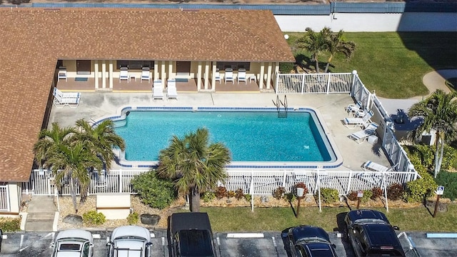 view of swimming pool with a patio