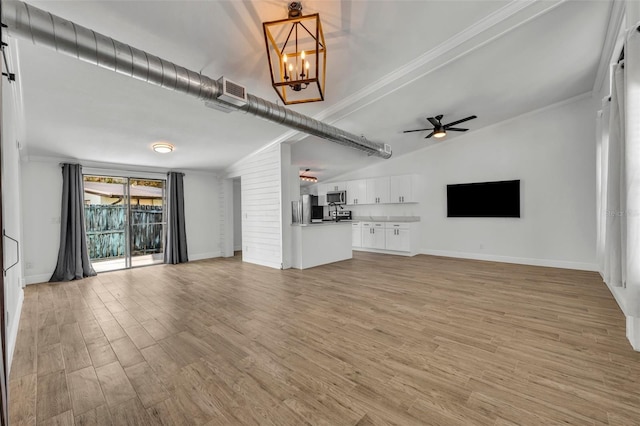 unfurnished living room with crown molding, lofted ceiling, ceiling fan with notable chandelier, and light hardwood / wood-style flooring