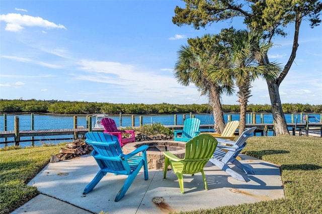 view of patio featuring a fire pit and a water view