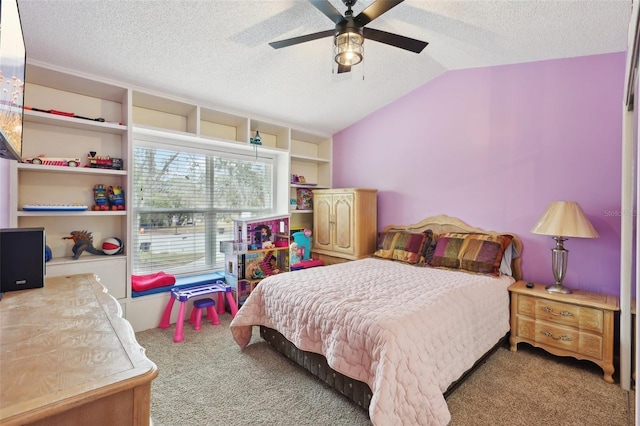 bedroom with ceiling fan, light colored carpet, a textured ceiling, and lofted ceiling