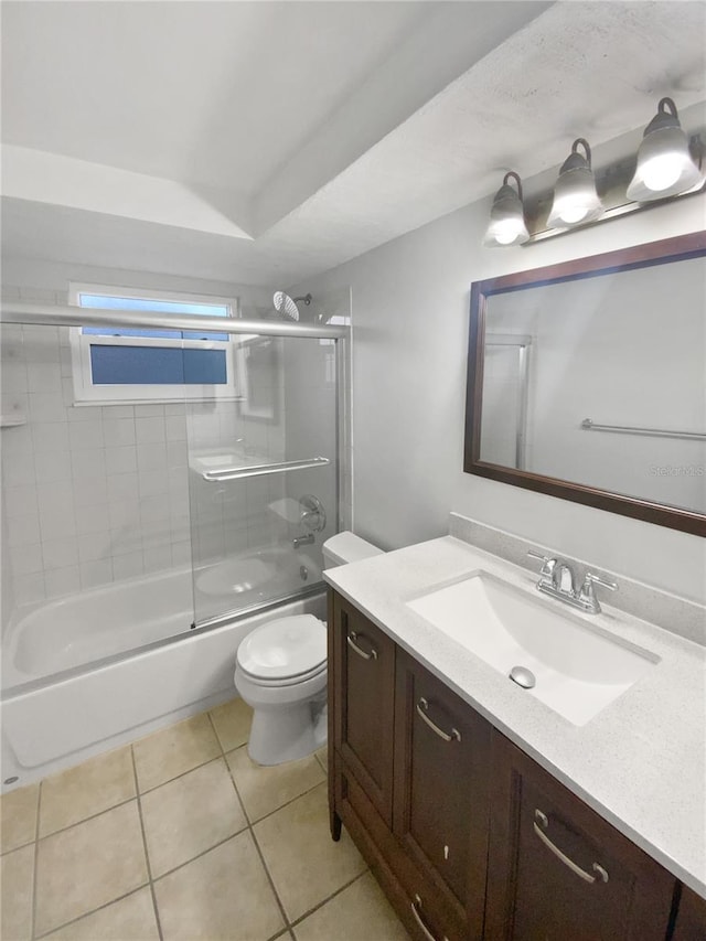 full bathroom with toilet, combined bath / shower with glass door, tile patterned flooring, and vanity