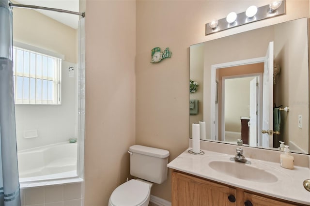 full bathroom with vanity and toilet