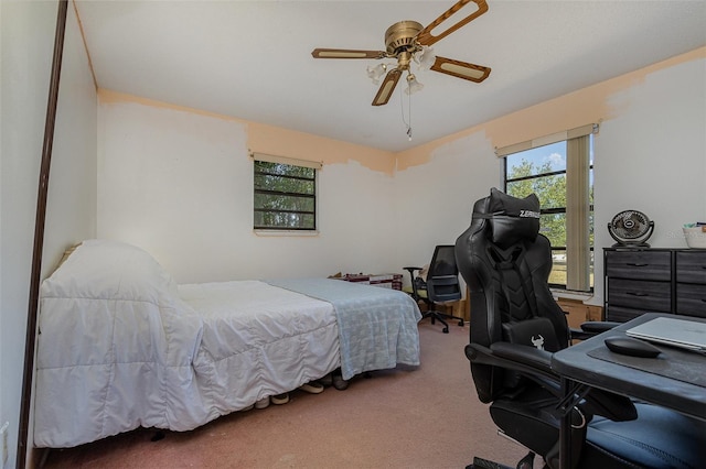 bedroom featuring ceiling fan and carpet flooring