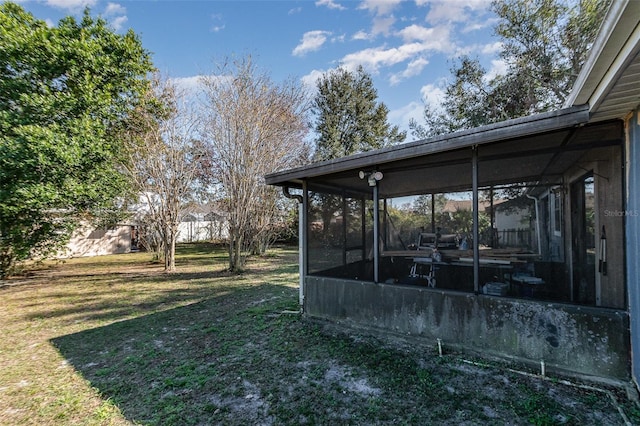 view of yard with a sunroom