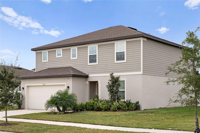 front of property with a garage and a front lawn