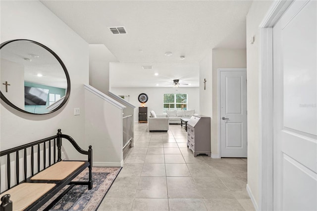 interior space with light tile patterned floors