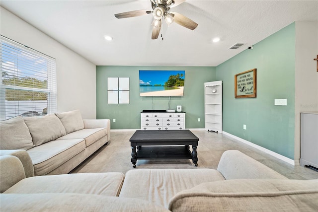 living room with ceiling fan