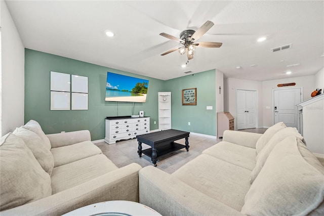 living room featuring ceiling fan