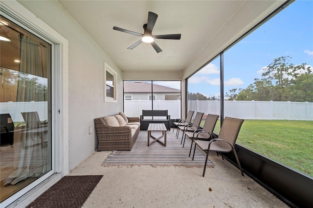 sunroom / solarium with ceiling fan