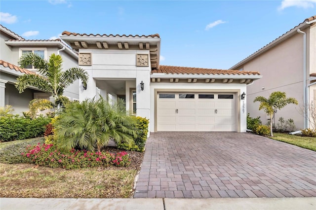 mediterranean / spanish-style house featuring a garage