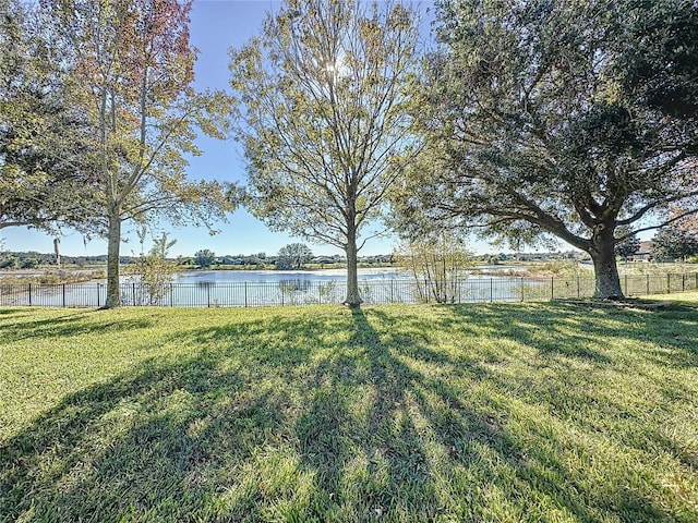 view of yard with a water view